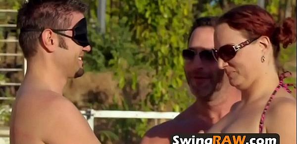  Horny couples are playing wild and sexy games blindfolded in the pool.